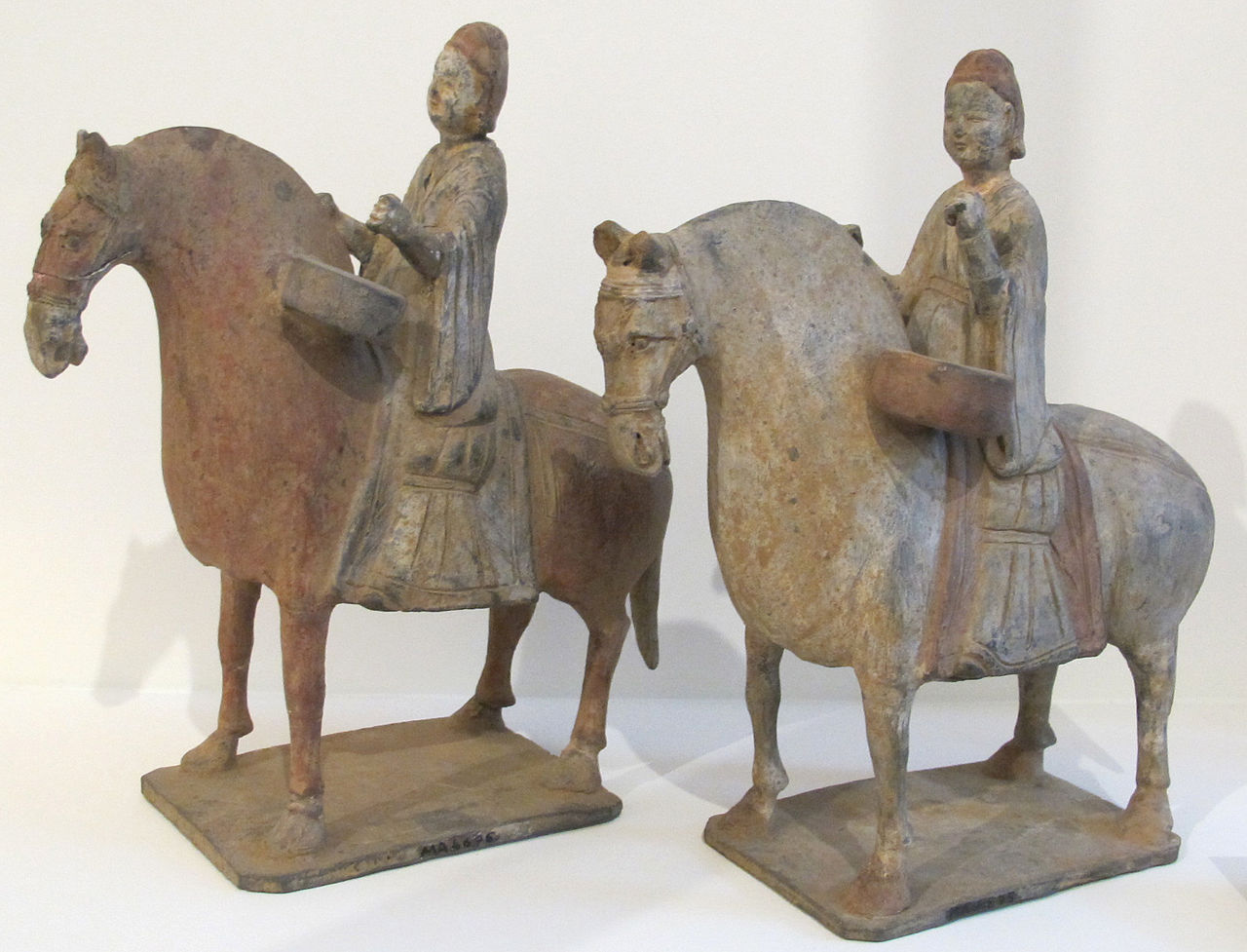 1280px-Dinastia_wei,_due_cavalieri_musicisti,_cina_del_nord,_500-550_ca..JPG