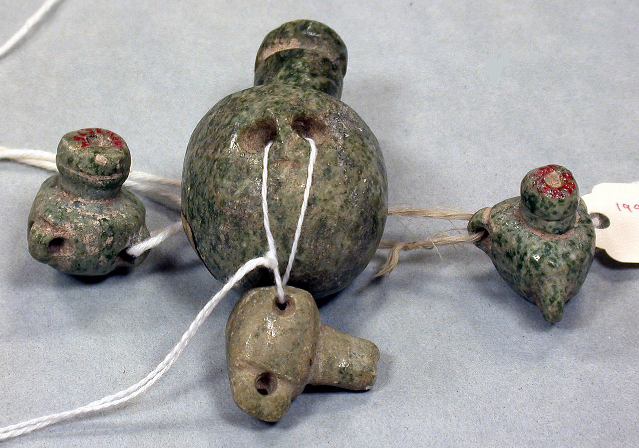 1280px-Miniature_Stone_Vases_MET_vs1994_35_753_56.jpg