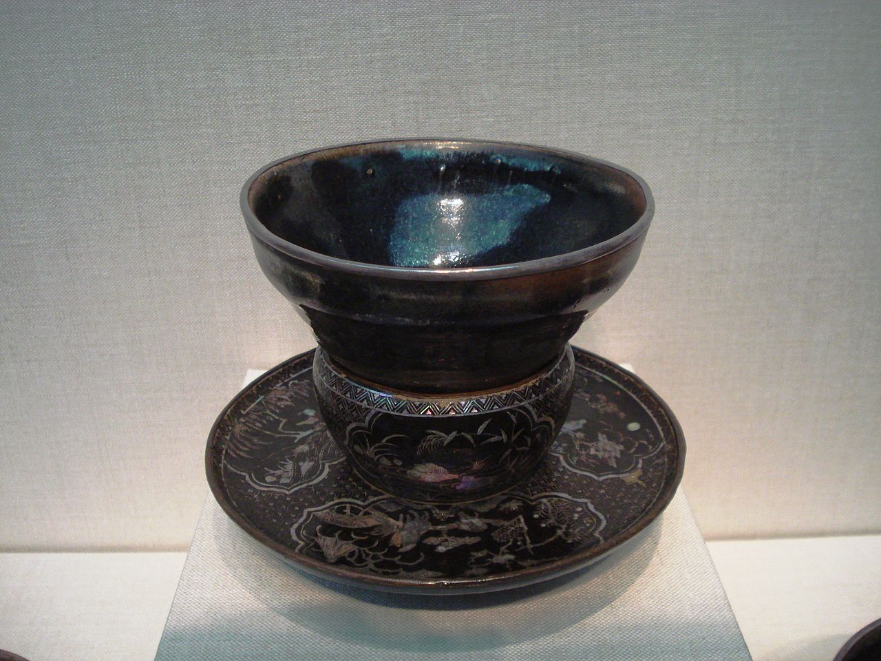 1280px-Song_Dynasty_tea_bowl_on_a_Ming_Dynasty_stand.jpg
