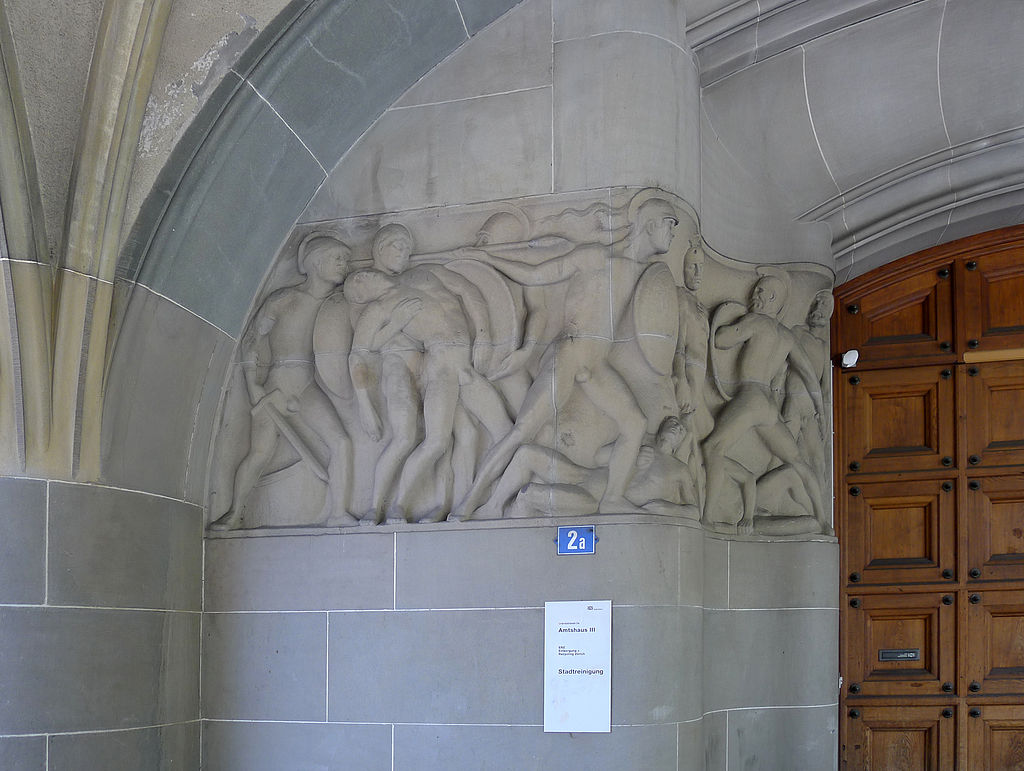14 024px-Zürich_Amtshaus_III,_Uraniastrasse_2a_-_Relief_links.jpg