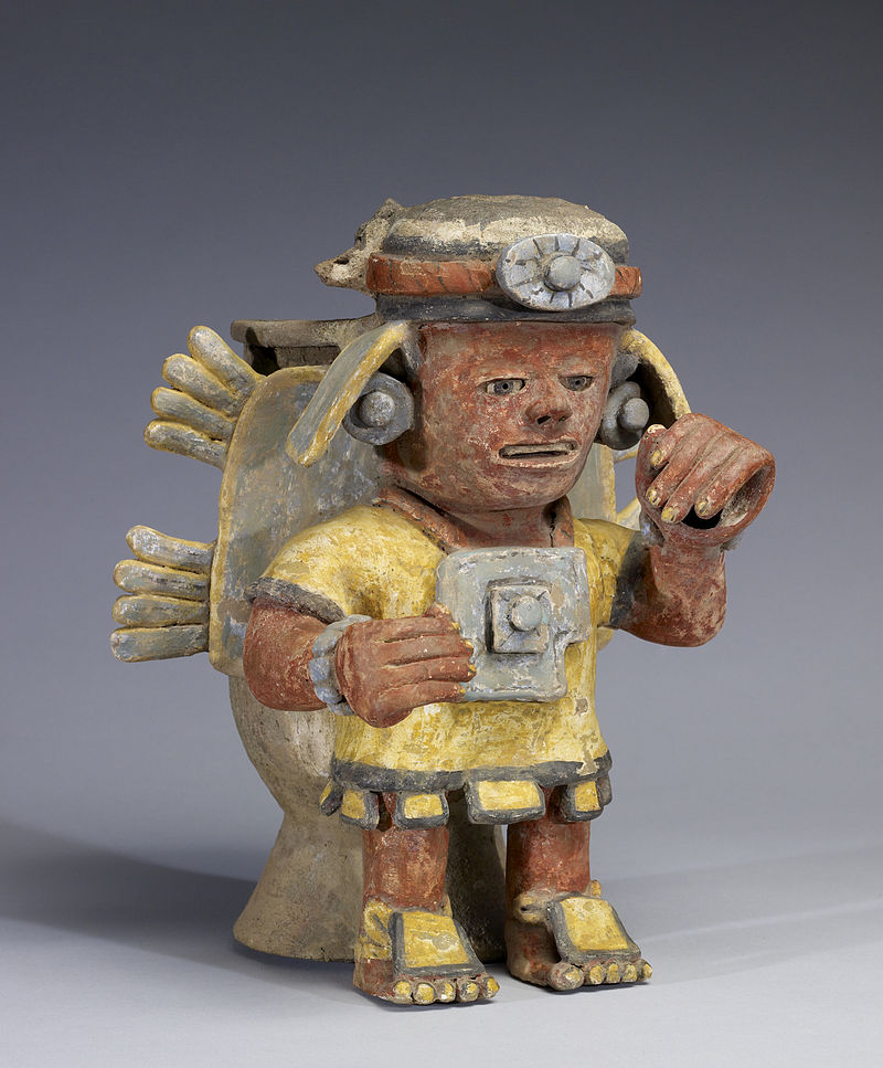 800px-Mixtec_-_Polychrome_Standing_Figure_with_Raised_Hand_-_Walters_482812_-_Three_Quarter.jpg