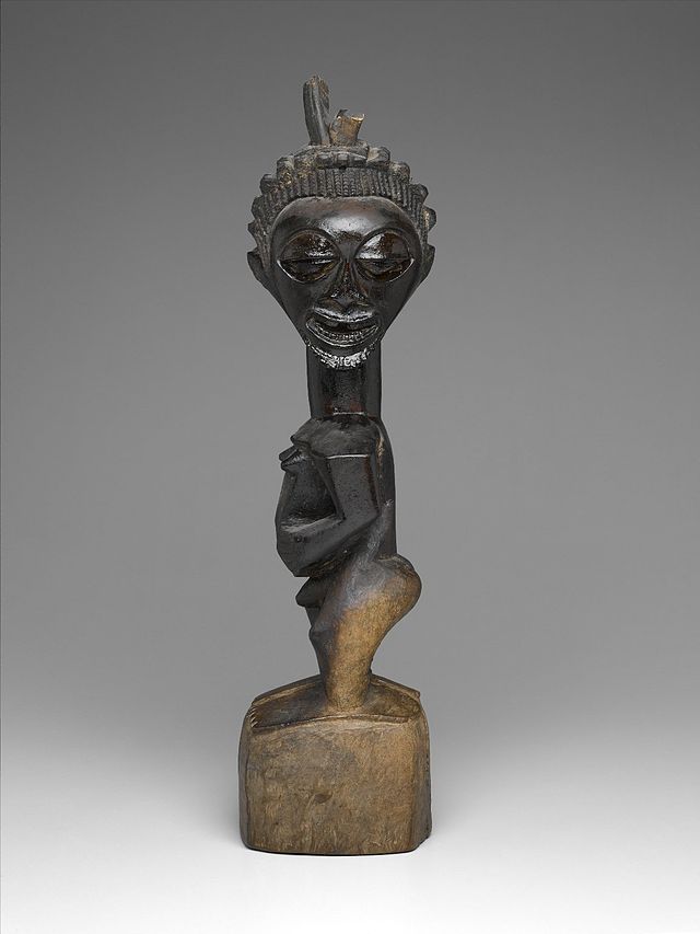 Brooklyn_Museum_2010.60_Standing_Male_Figure_with_Head_Turned_Left_Nkishi_(3).jpg