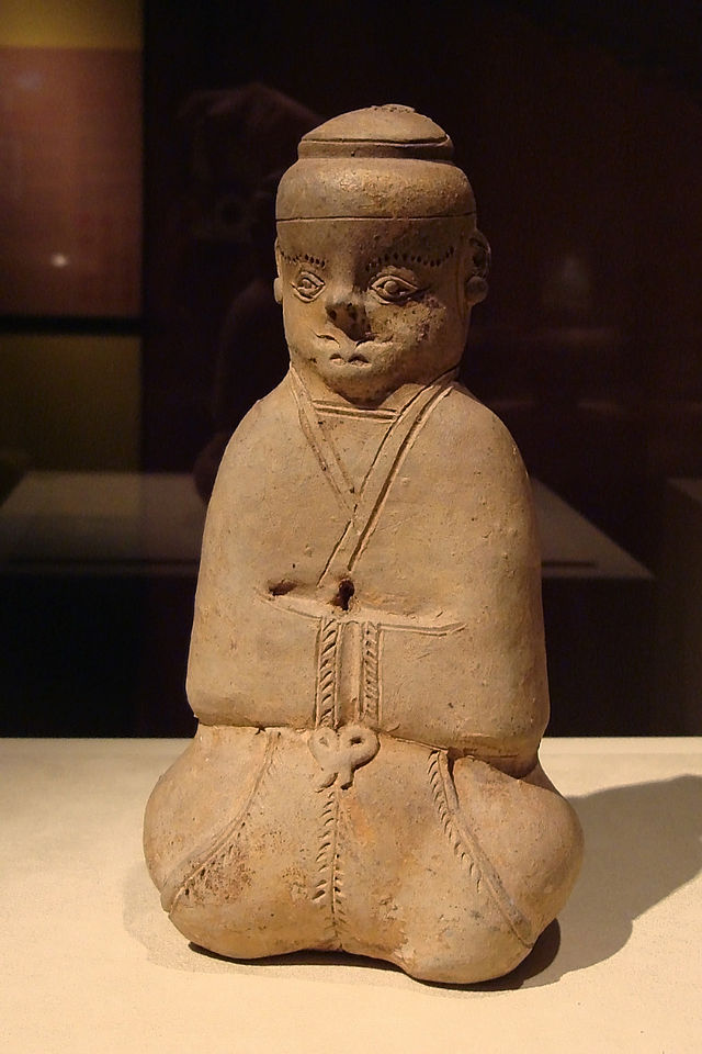 CMOC_Treasures_of_Ancient_China_exhibit_-_celadon_figure_of_a_male_servant.jpg