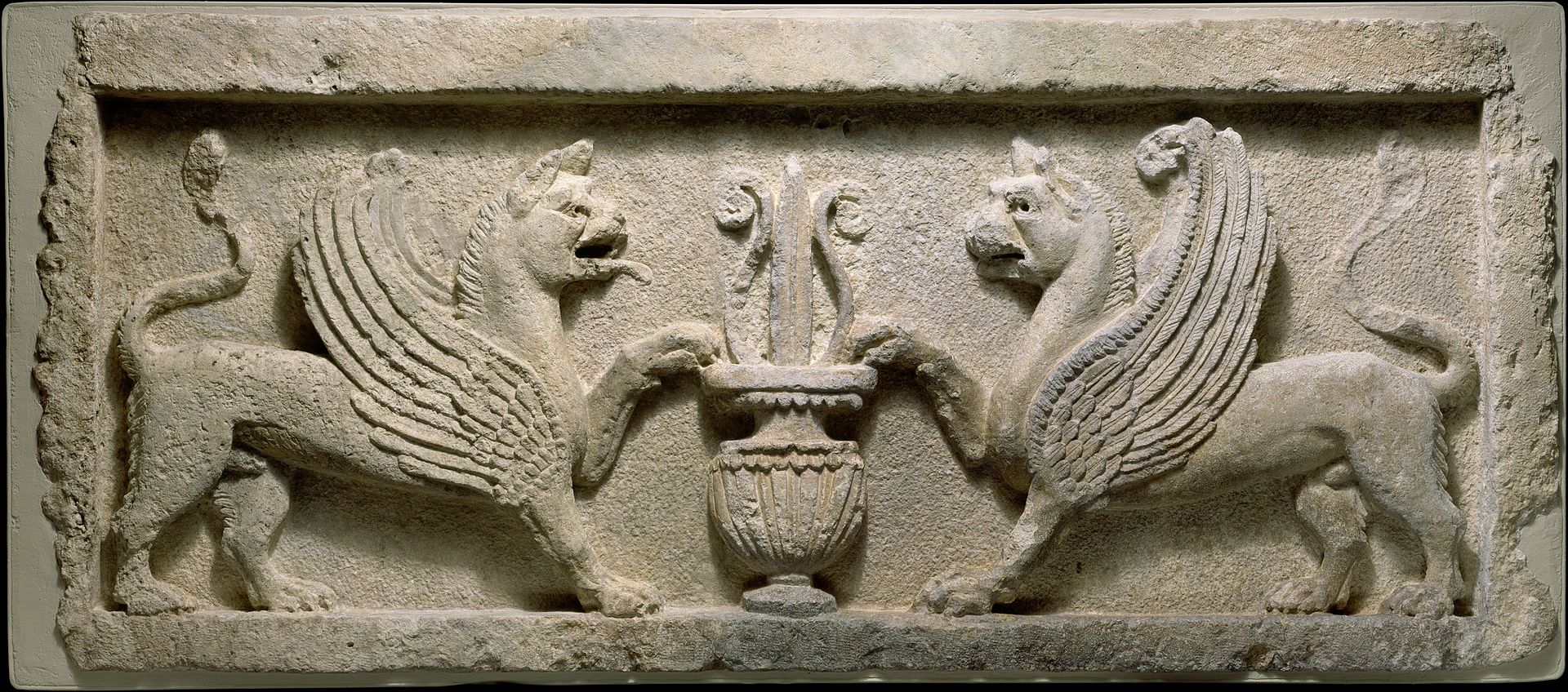 Door_lintel_with_lion-griffins_and_vase_with_lotus_leaf_MET_DT913.jpg