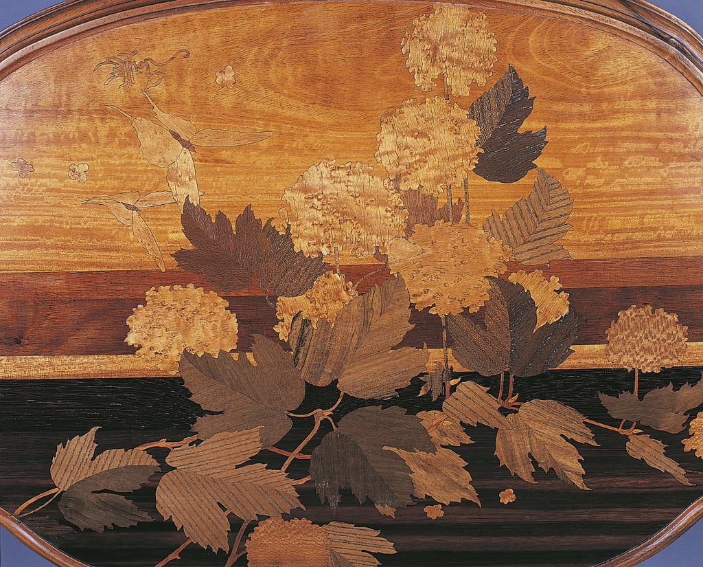 Emile_Galle_-_Close-up_of_an_oval_tea_table_France_-_(MeisterDrucke-1089362).jpg
