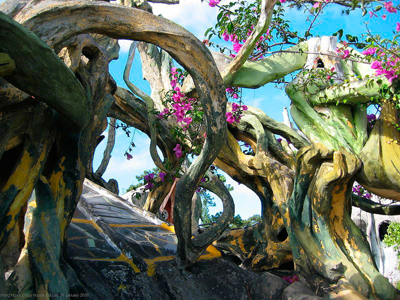 exotic-and-strange-architecture-of-hang-nga-guesthouse-in-vietnam-trees-and-flower.jpg