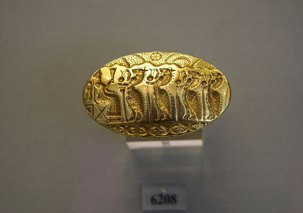 Gold_ring_with_relief_Sitting_Goddess_and_seahorses_Mycenaean,_NAMA_6208_080858.jpg