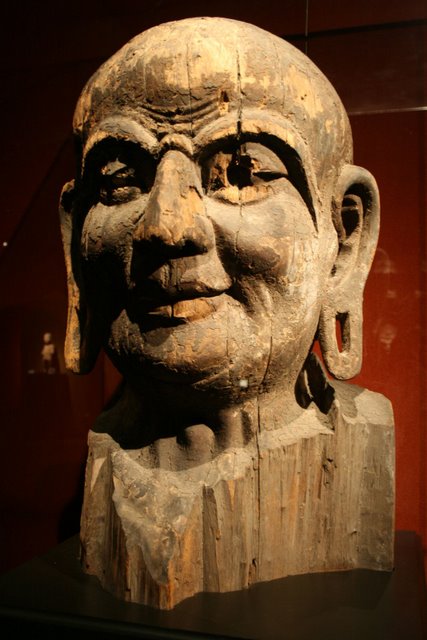 Head_of_Kashyapa,_wood,_Tang_Dynasty.JPG