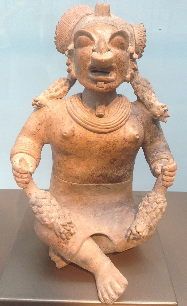 Jama-Coaque_statue_of_a_sitting_woman_with_ananasses.jpg