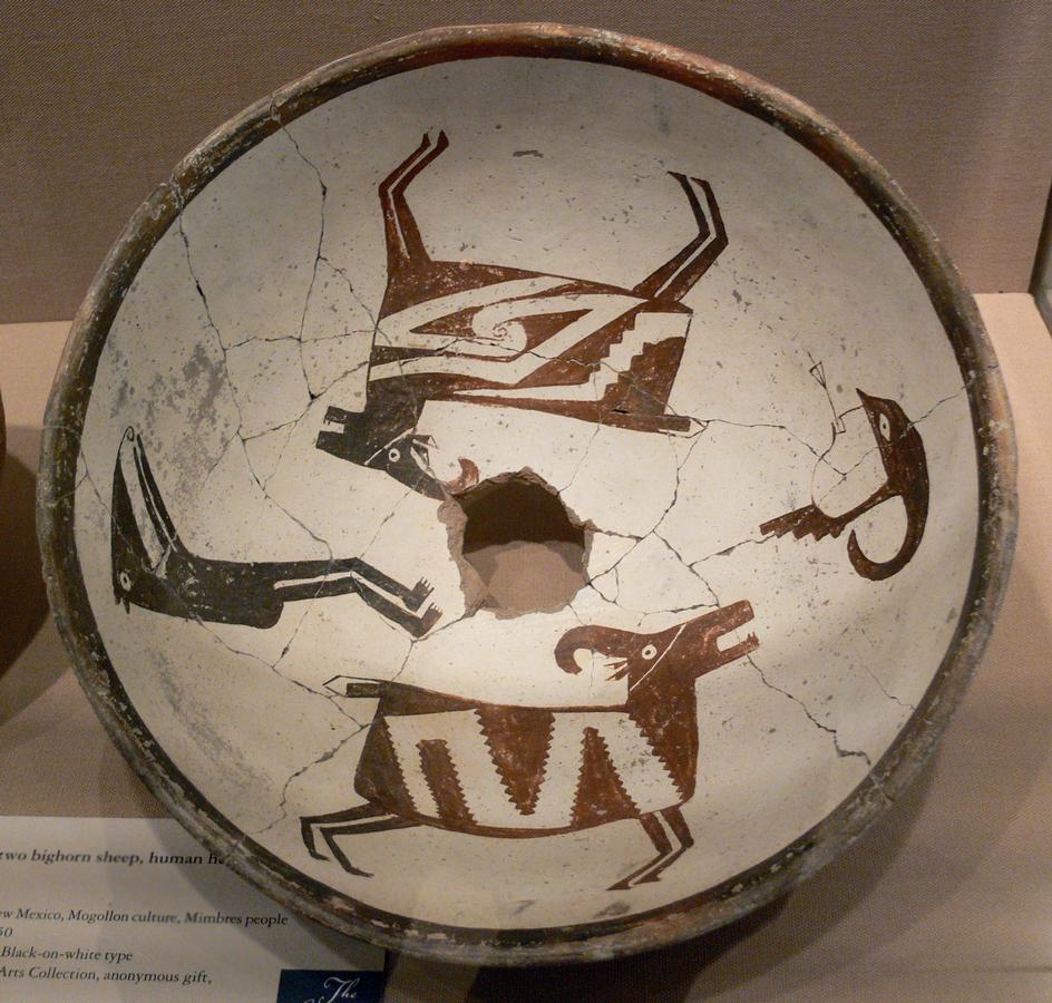 Mimbres_Bowl_with_two_bighorn_sheep_human_head_and_figure_DMA_1990-219-FA.jpg