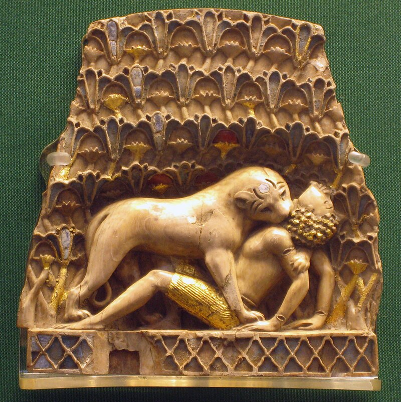 Nimrud_ivory_lion_eating_a_man.jpg