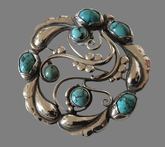 Turquoise-cabochons-ornamental-sterling-silver-brooch.jpg