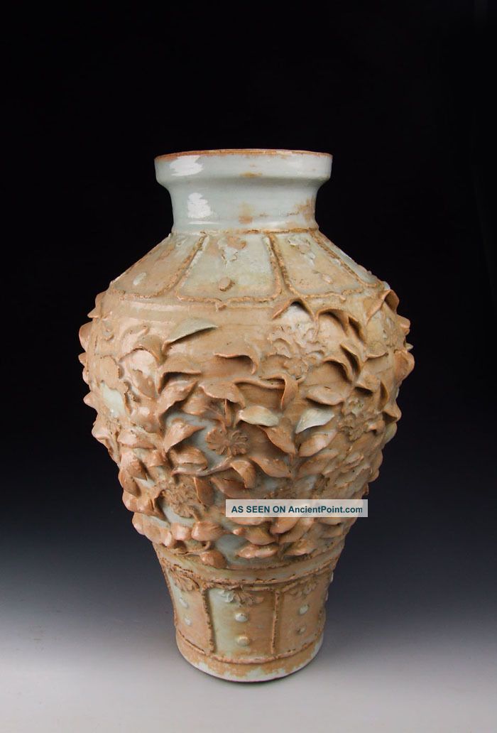 yuan_dynasty_egg_white_glazed_porcelain_plum_vase_with_basso___relievo_flower_patt_1_lgw.jpg